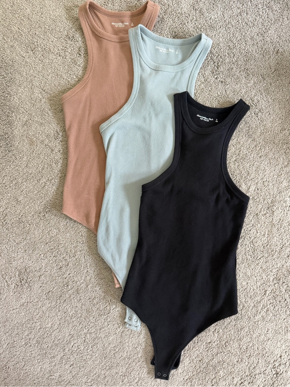 X3 size small Abercrombie and Fitch high neck bodysuits. In good condition.